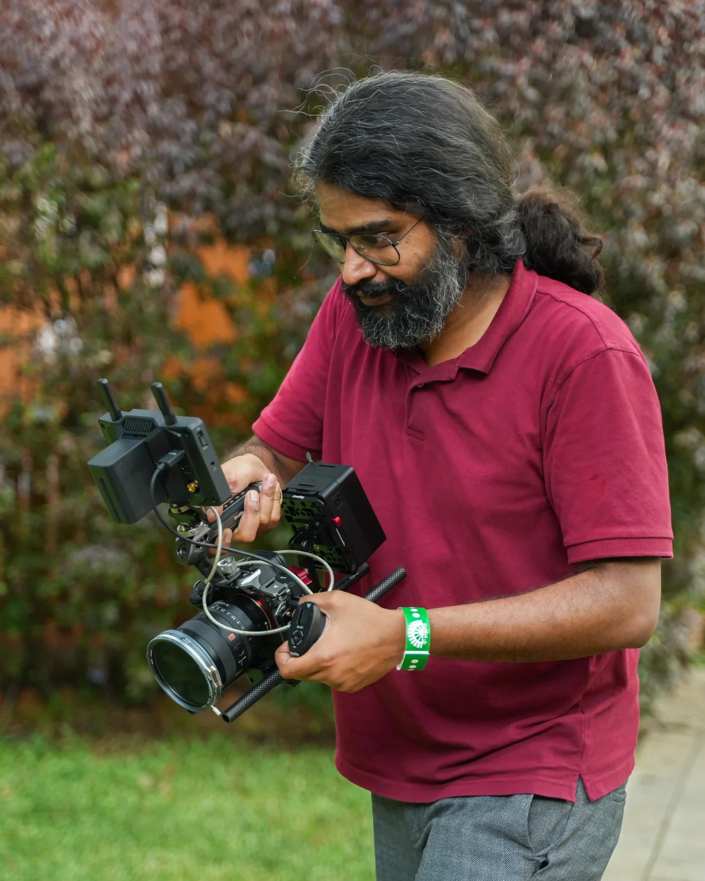 Prasad Nagendra operating a cinema camera rig on location