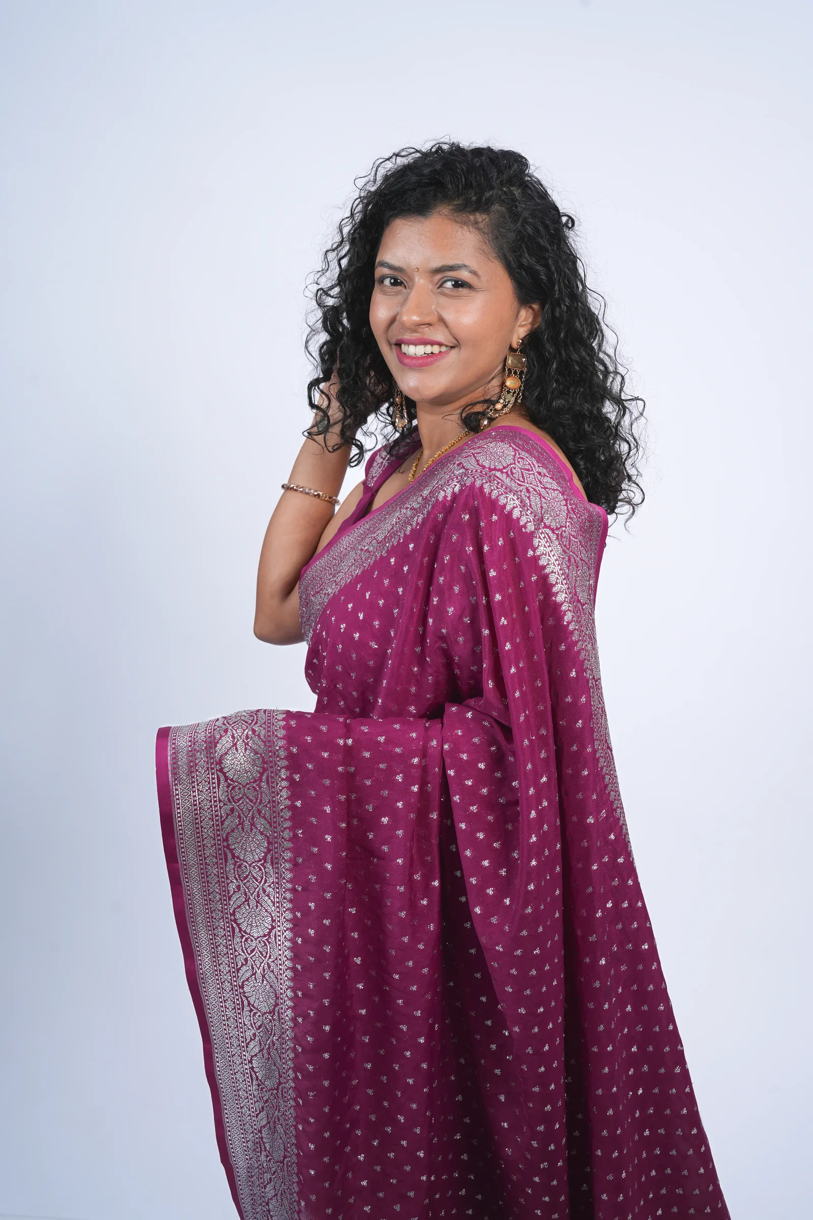 Studio portrait, magenta saree