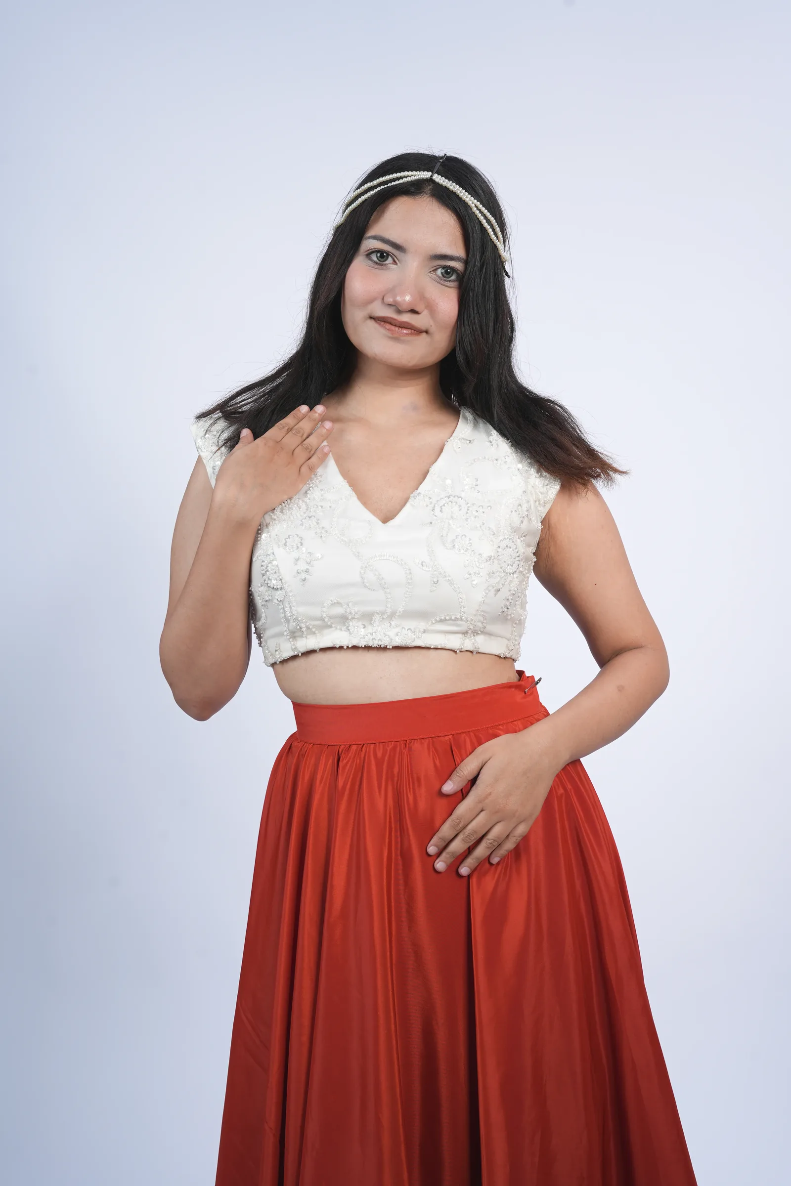 Studio portrait, white and red outfit