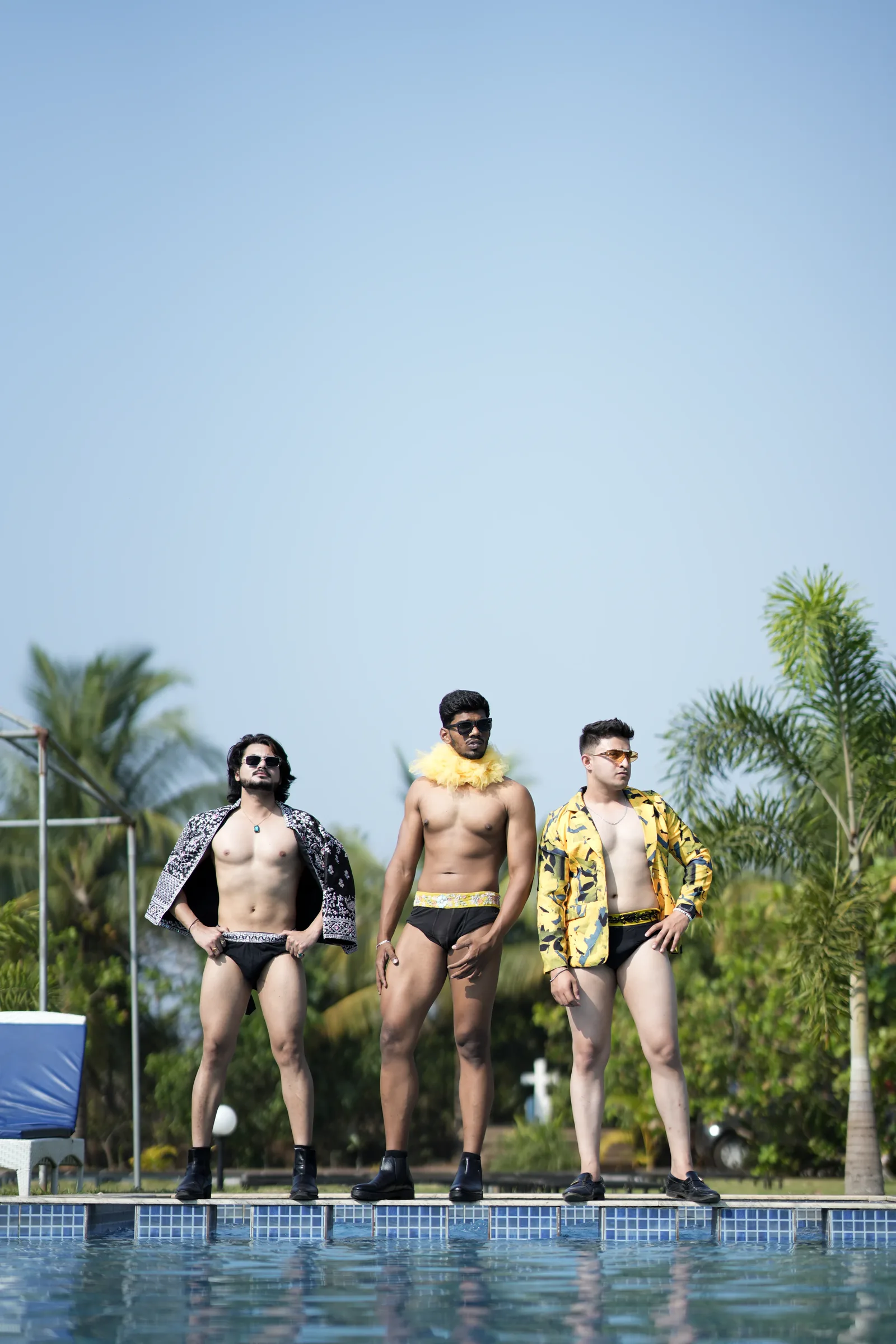 Trio of models poolside