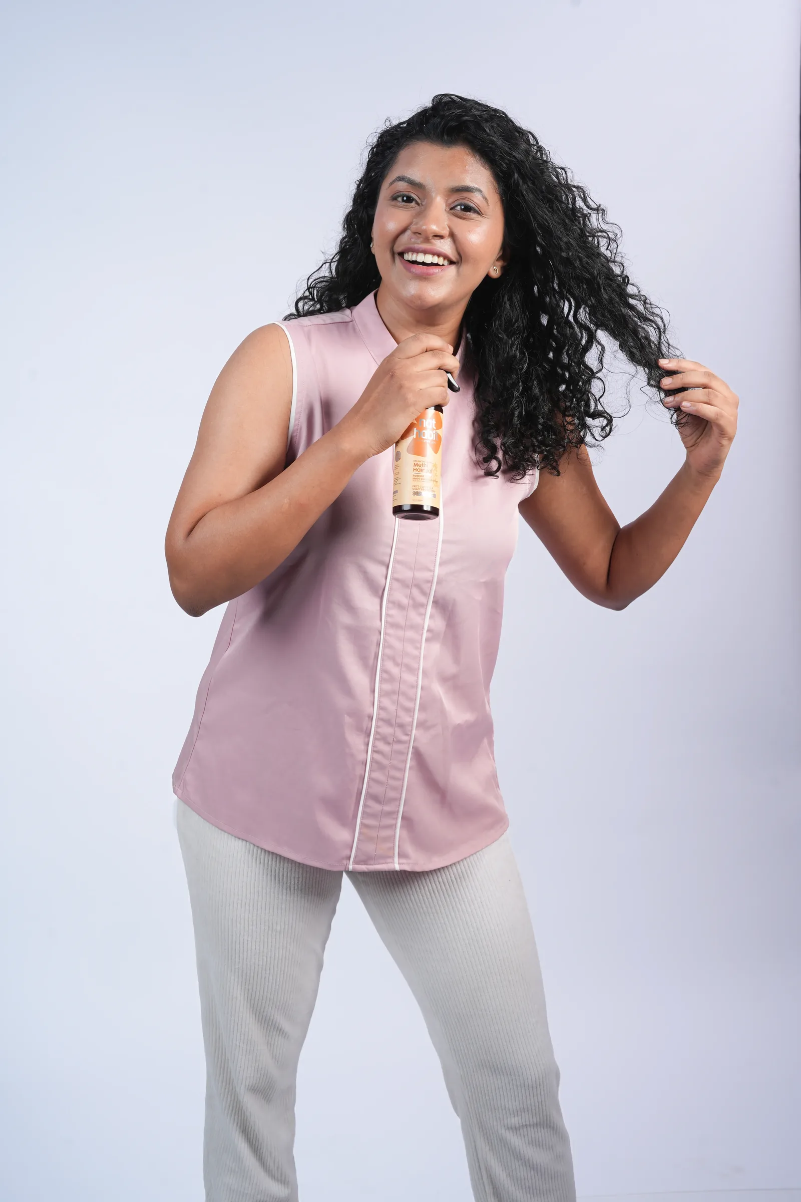 Joyful commercial shot with hair product